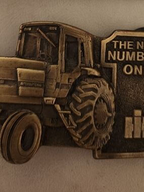 International Harvestor Brass-Tone Belt Buckle with Raised Logo